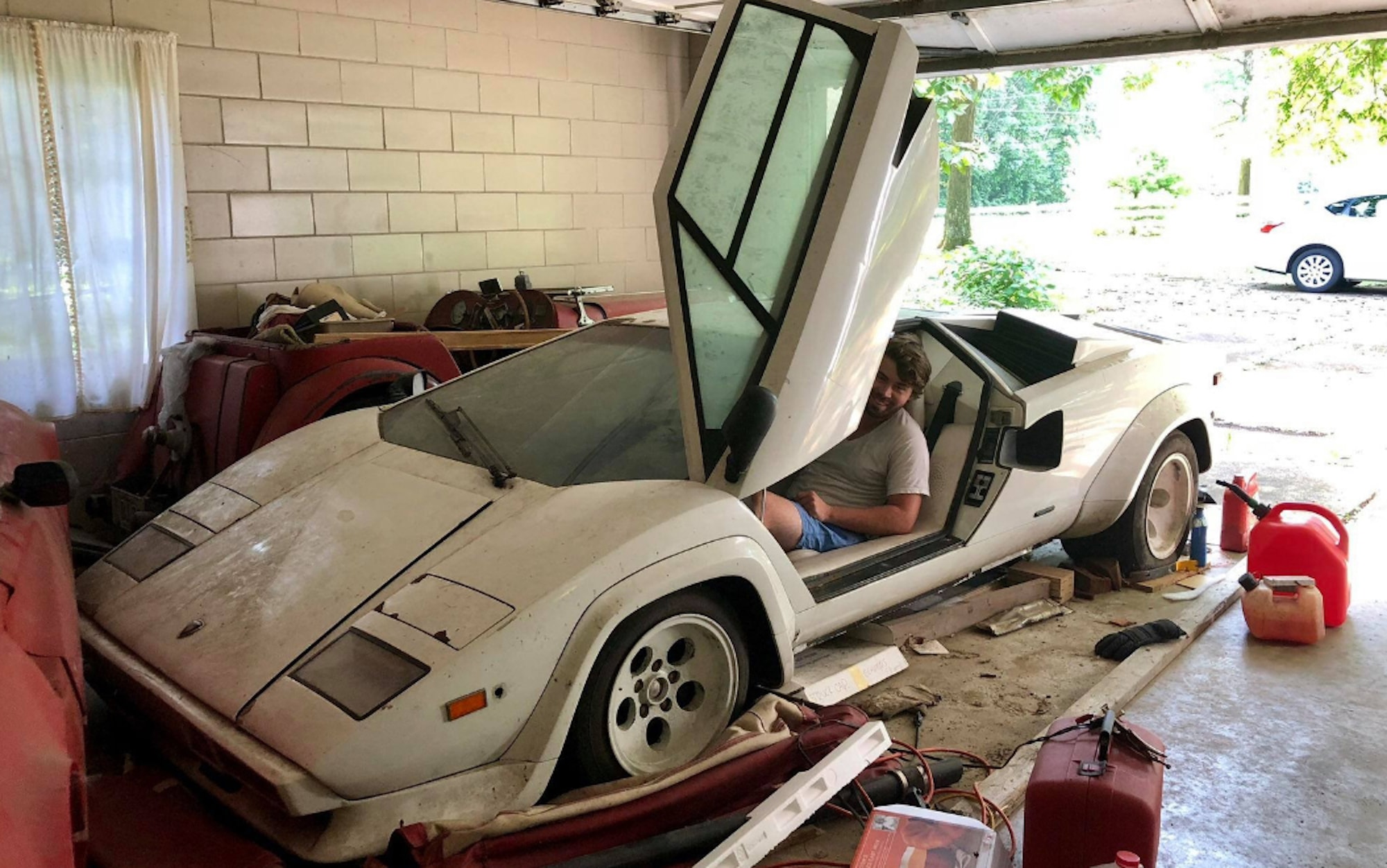 Student Helps Grandma Clean Up and Finds Two Supercars Hidden 20 Years